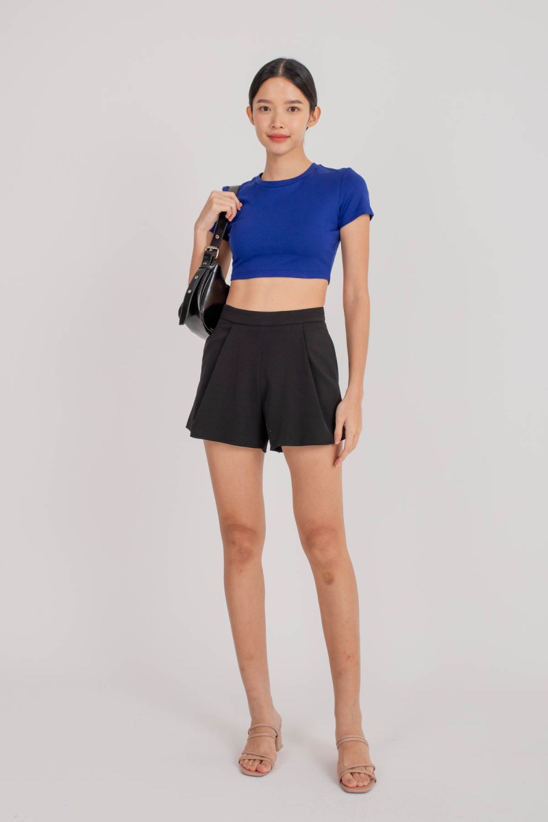 BACKORDERS2: Transition Pleated Flare Shorts in Black