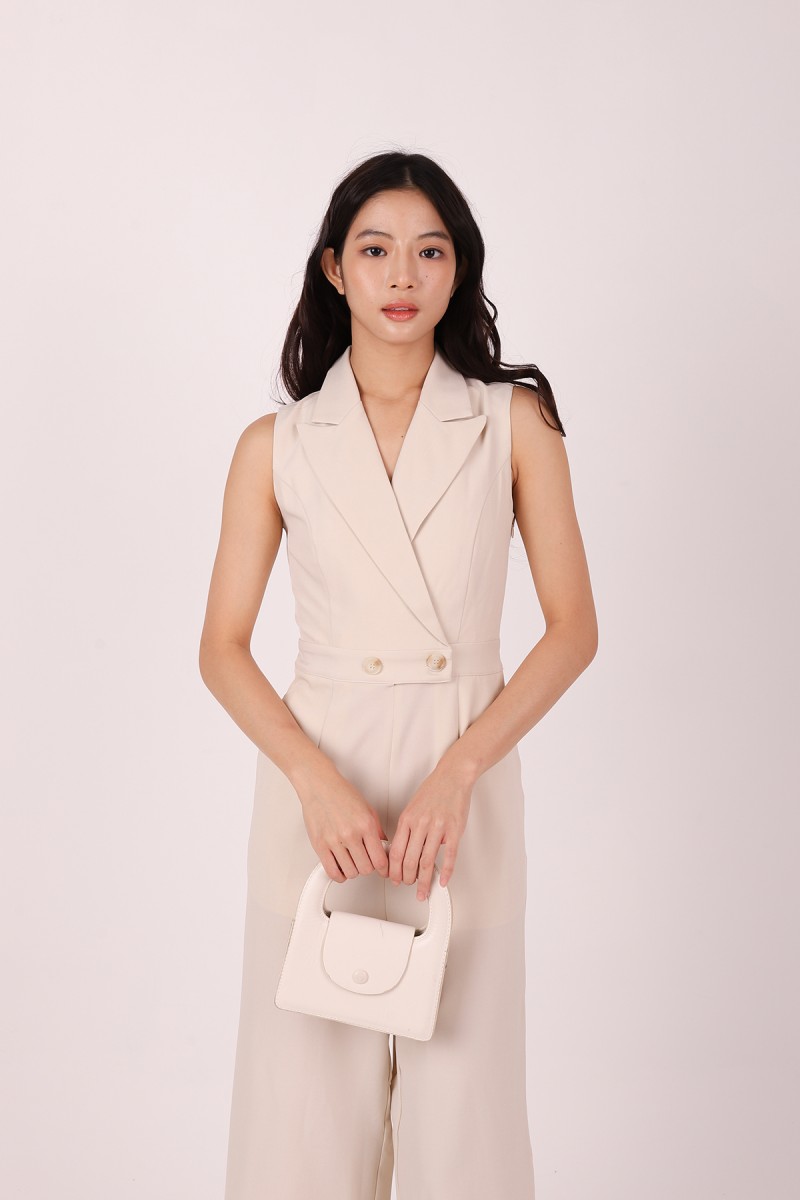 Avestia Collared Sleeveless Jumpsuit in Cream