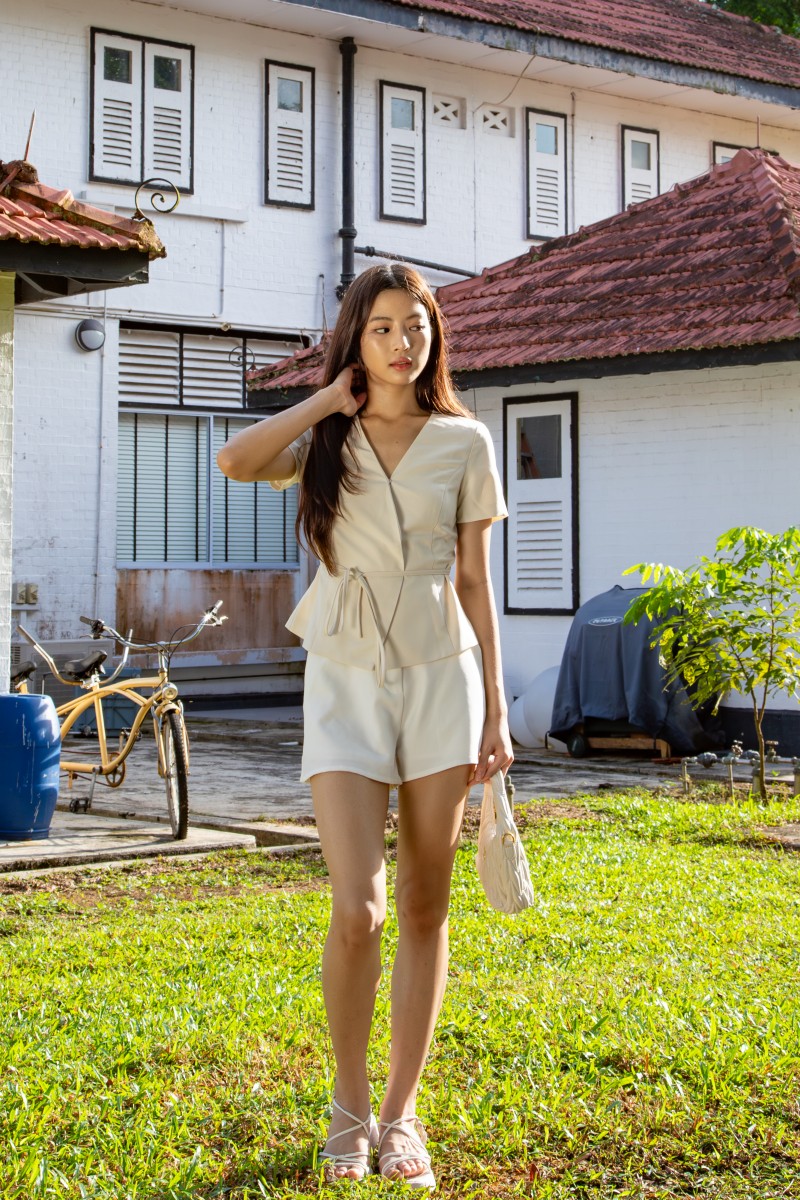 Jorelle Wrap Peplum Top in Ivory
