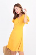 Sharmie Backless Flutter Dress in Mustard