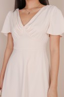 Amalie Ruched Flutter Dress in Cream