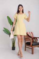 Velix Cut-Out Puff Dress in Yellow