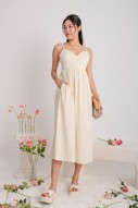 Keyrie Padded Flare Maxi Dress in Cream